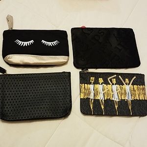 4 black makeup bags